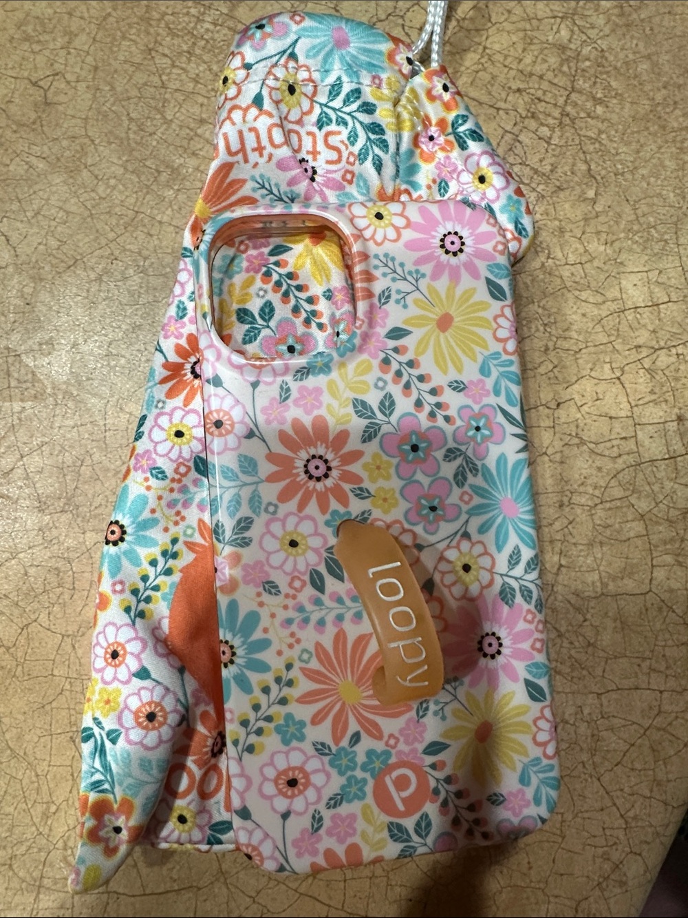 I phone 14 Loopy Case Floral Phone Strap Case - Pink, Orange, Yellow, Blue.